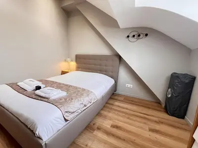 Un ou plusieurs lits dans un hébergement de l'établissement E - Le loft in Epernay T2 au cœur du centre ville