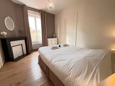 Un ou plusieurs lits dans un hébergement de l'établissement E - La bulle de champagne T3 proche centre-ville