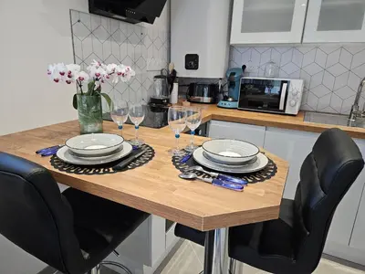 Cuisine ou kitchenette dans l'établissement O Cottage E Lavisse