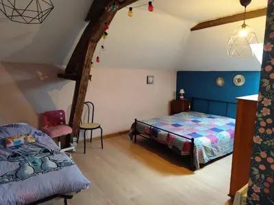 Un ou plusieurs lits dans un hébergement de l'établissement Grande maison familiale au vert