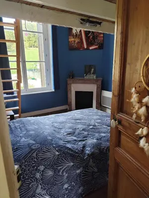 Un ou plusieurs lits dans un hébergement de l'établissement Grande maison familiale au vert