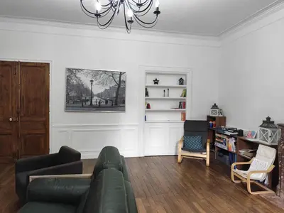 Coin salon dans l'établissement Grande maison familiale au vert