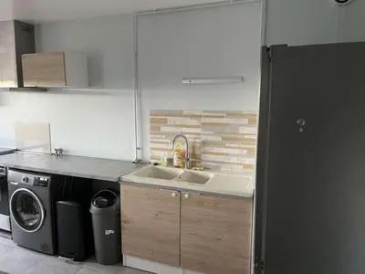 Cuisine ou kitchenette dans l'établissement Appartement spacieux 4 personnes sixième