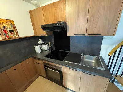 Cuisine ou kitchenette dans l'établissement Appartement lumineux et moderne proche gare
