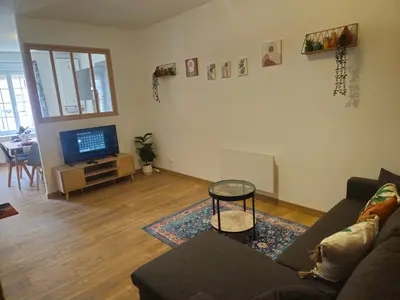 Télévision ou salle de divertissement dans l'établissement Grand appartement familial 47m2 au 1er etage