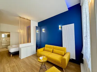 Coin salon dans l'établissement Wellness Suite Ponsardin 1 - Reims Centre