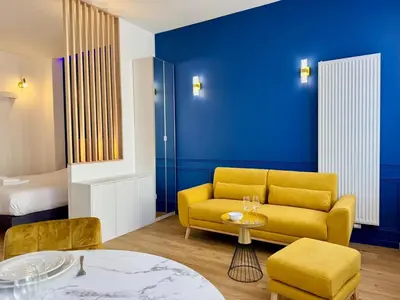 Coin salon dans l'établissement Wellness Suite Ponsardin 1 - Reims Centre