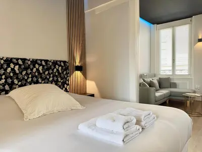 Un ou plusieurs lits dans un hébergement de l'établissement Wellness Suite Ponsardin 2 - Reims Centre
