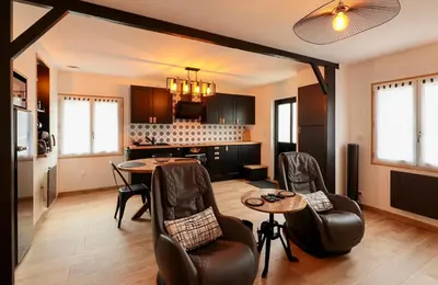 Coin salon dans l'établissement La Ptite Maison Ardennaise
