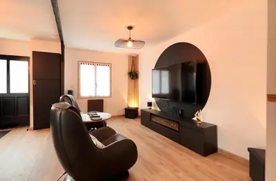 Télévision ou salle de divertissement dans l'établissement La Ptite Maison Ardennaise
