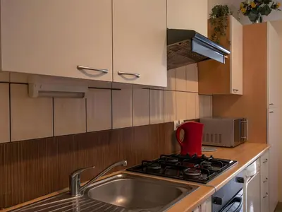 Cuisine ou kitchenette dans l'établissement Maison de campagne au cœur des vignes
