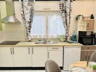 Cuisine ou kitchenette dans l'établissement L'Orée du 54 - Hypercentre Reims