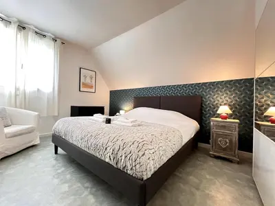 Un ou plusieurs lits dans un hébergement de l'établissement Claudius maison 3 chambres avec jardin proche Fac