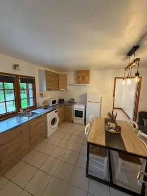 Cuisine ou kitchenette dans l'établissement Le Hiboux
