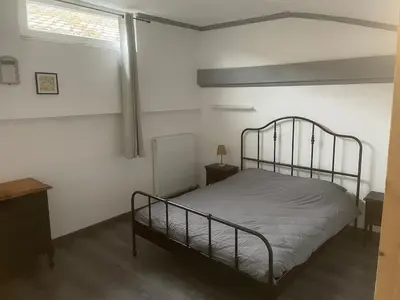 Un ou plusieurs lits dans un hébergement de l'établissement Appartement dans un cadre bucolique
