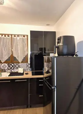 Cuisine ou kitchenette dans l'établissement Studio Cosy 32 m2 hyper centre Châlons-en-Champagne