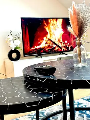 Télévision ou salle de divertissement dans l'établissement La perle des capucins