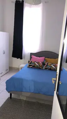 Un ou plusieurs lits dans un hébergement de l'établissement Saint Quentin city center apartment