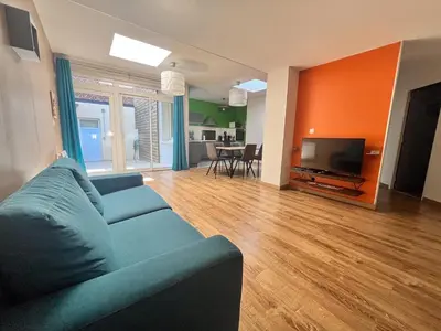 Coin salon dans l'établissement Logement au coeur de Roye
