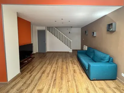Coin salon dans l'établissement Logement au coeur de Roye