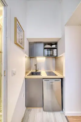Cuisine ou kitchenette dans l'établissement Le Bauhaus