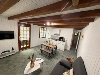 Télévision ou salle de divertissement dans l'établissement Le Chalet
