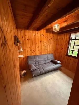 Coin salon dans l'établissement Le Chalet