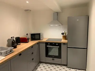 Cuisine ou kitchenette dans l'établissement Maison authentique en bord de Meuse