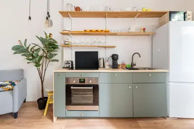 Cuisine ou kitchenette dans l'établissement Le Temps Terrasse