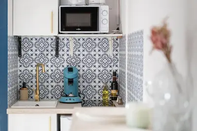 Cuisine ou kitchenette dans l'établissement Le Douillet