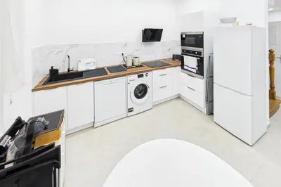 Cuisine ou kitchenette dans l'établissement La parenthèse verte