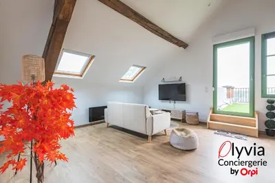 Télévision ou salle de divertissement dans l'établissement Appartement Vue Cathédrale