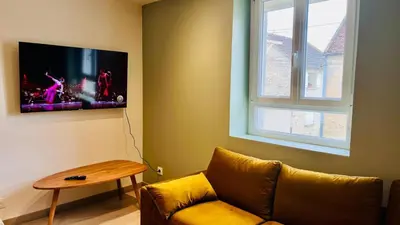 Télévision ou salle de divertissement dans l'établissement Le Triplex Chic & Choc - Disneyland Paris