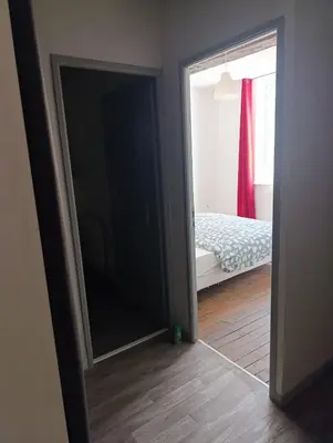 Un ou plusieurs lits dans un hébergement de l'établissement Appartement Cosy du château