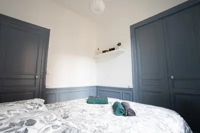 Un ou plusieurs lits dans un hébergement de l'établissement Le Bobo Rémois - Center - Cathedral