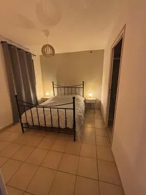 Un ou plusieurs lits dans un hébergement de l'établissement Appartement cosy au cœur de la vallée de la Marne