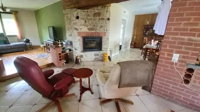 Coin salon dans l'établissement Holiday house in the Ardennes