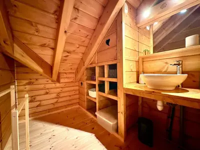 Salle de bains dans l'établissement Au Chalet d'Aurélie