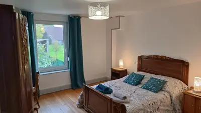 Un ou plusieurs lits dans un hébergement de l'établissement Maison de famille entière, 4 chambres, 10 couchages, piscine selon période