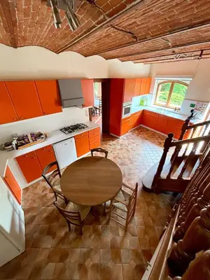Cuisine ou kitchenette dans l'établissement Gîte Chez Tio Père - 12 personnes