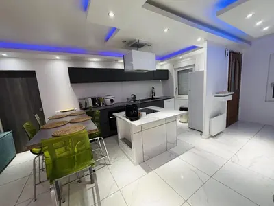 Cuisine ou kitchenette dans l'établissement Maison moderne au cœur de la Champagne
