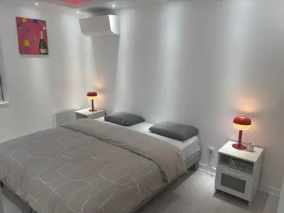 Un ou plusieurs lits dans un hébergement de l'établissement Maison moderne au cœur de la Champagne