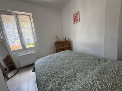 Un ou plusieurs lits dans un hébergement de l'établissement Gîte des Prés