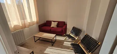 Coin salon dans l'établissement Cozyhouse 2 chambre, 6 personnes avec jardin