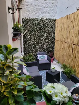 Jardin de l'établissement Maison centre ville au calme avec patio et garage