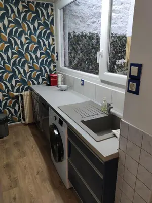 Cuisine ou kitchenette dans l'établissement Maison centre ville au calme avec patio et garage