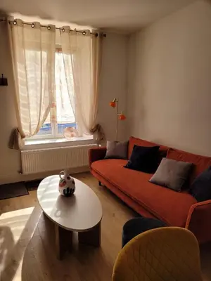 Coin salon dans l'établissement Maison centre ville au calme avec patio et garage