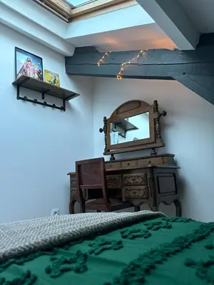 Télévision ou salle de divertissement dans l'établissement Maison de ville Champenoise