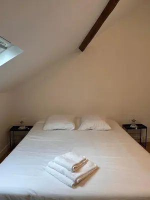 Un ou plusieurs lits dans un hébergement de l'établissement Appartement Luna 8p Vue Hôtel de Ville Charleville