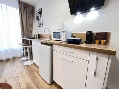 Cuisine ou kitchenette dans l'établissement Paris 21 - Studio charmant proche du centre-ville